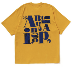 BAPE Yellow Text Graphic Tee